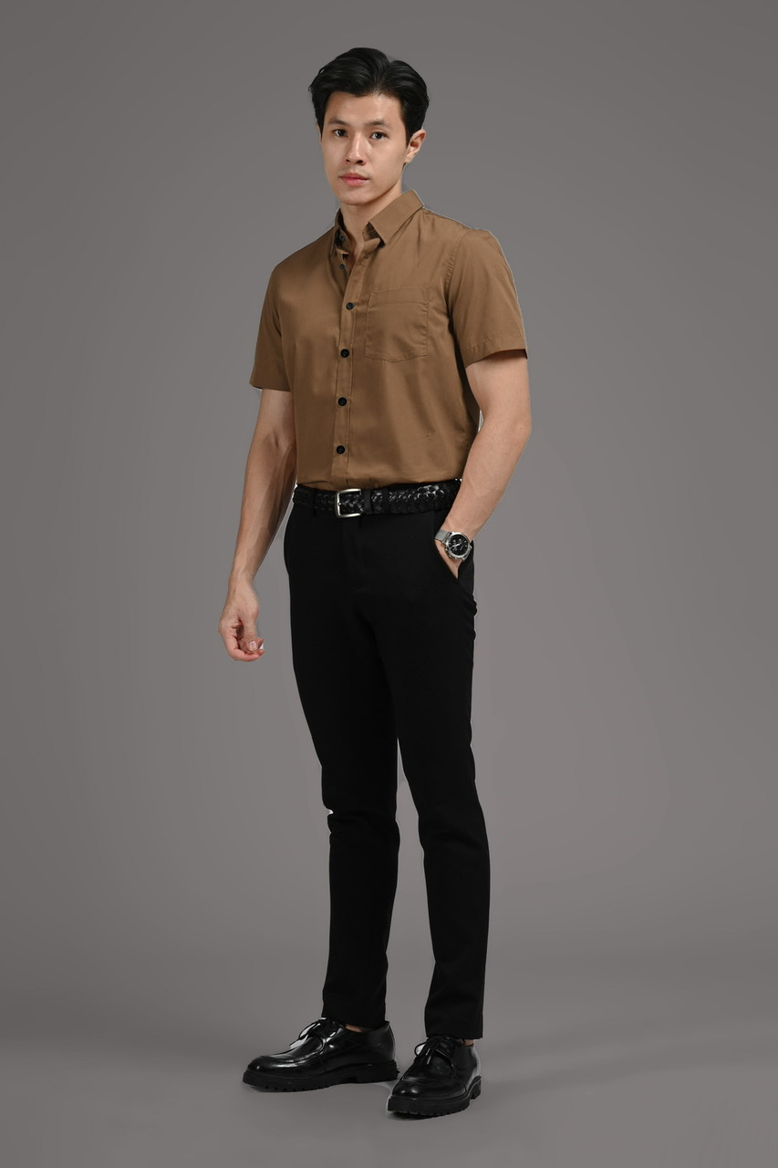 Teenage boy with brown hair and eyes Wearing black shirt and khaki pants  Good looking Casual wear Expressions Studio portrait isolated on grey  background Stock Photo by ysbrand 13434786